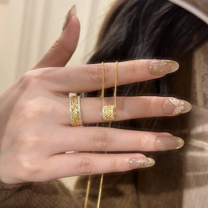 Goldene Ohren des Weizendesignrings und Halskette