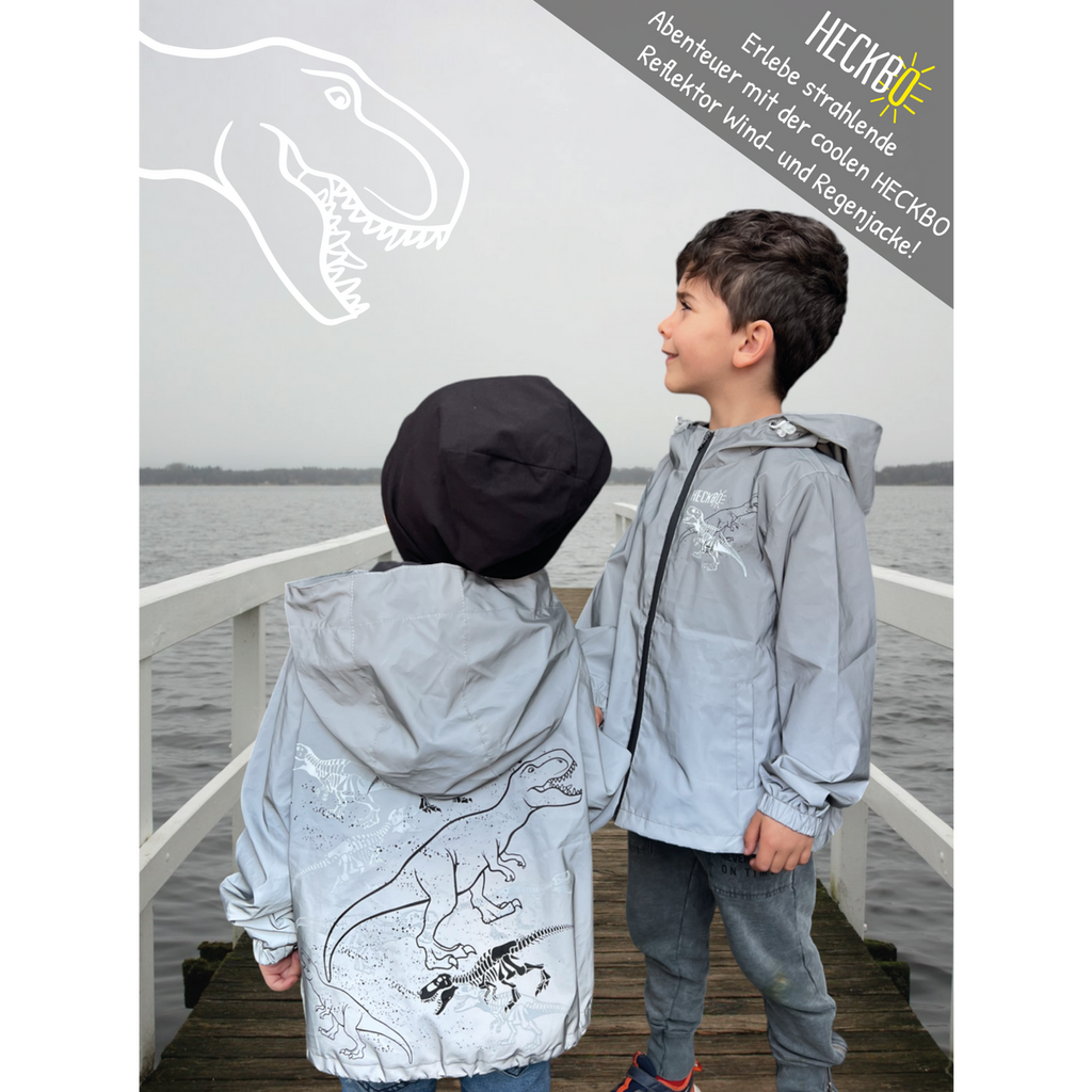 Reflektierende Kinderjacke Dinosaurier Vorderansicht wasserdicht