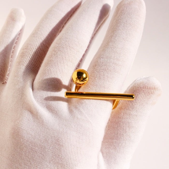 Skulpturaler Balken und Punktring