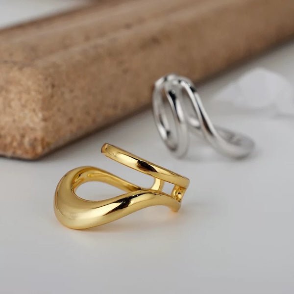 Doppelte Ohrklemme aus Gold und Silber