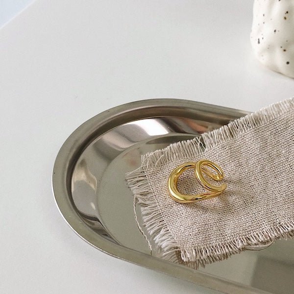 Doppelte Ohrklemme aus Gold und Silber