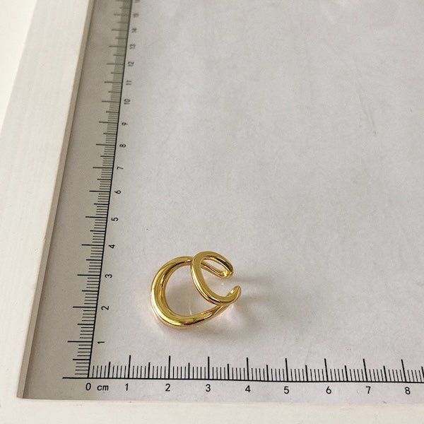 Doppelte Ohrklemme aus Gold und Silber