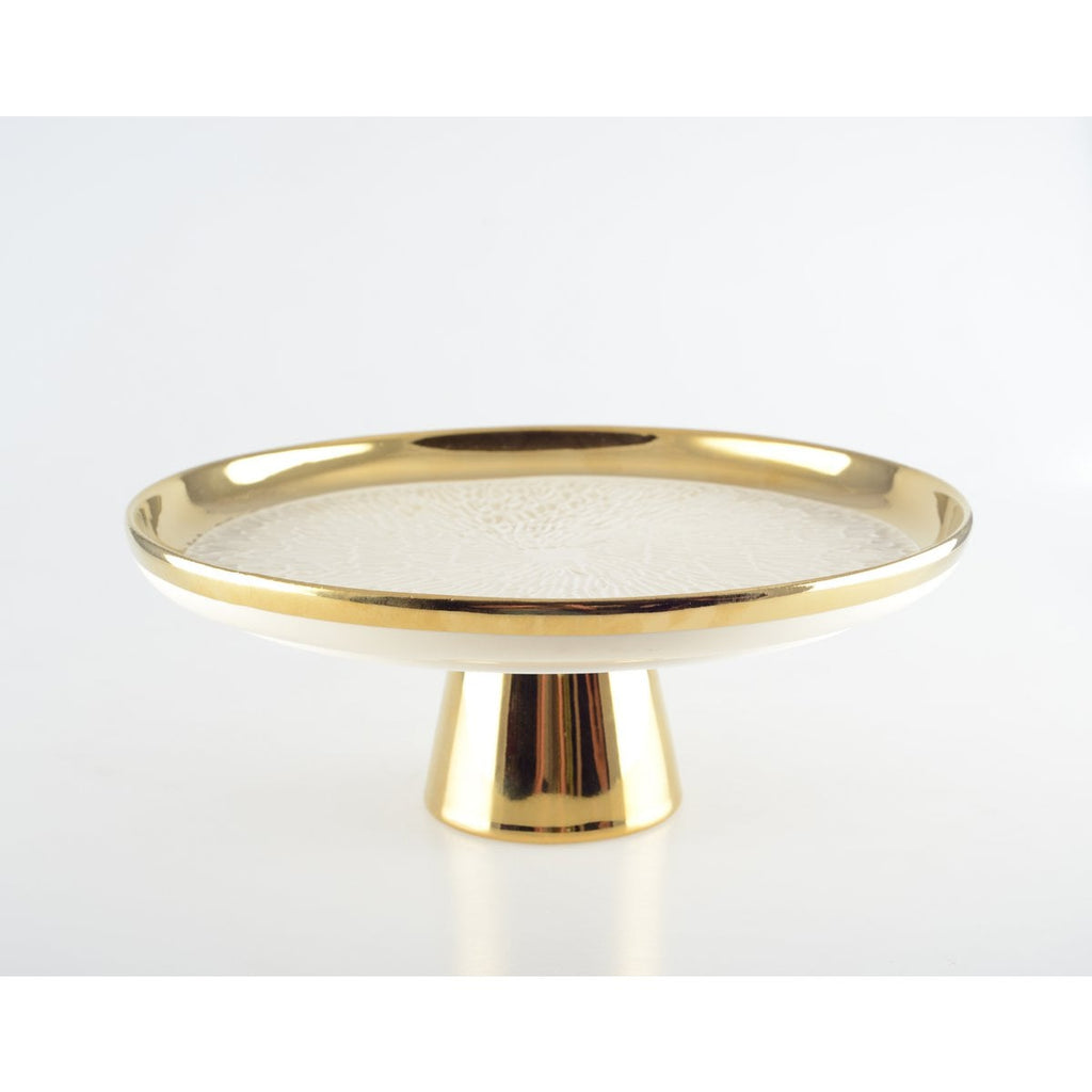 Cremige Kuchenschale mit goldener Kante