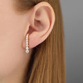 Elegante funkelnde Ohrringe
